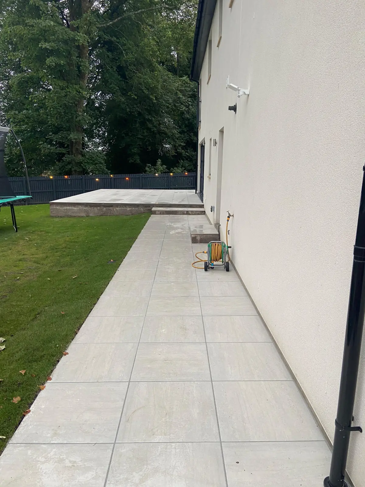 Porcelain paving path alongside the house