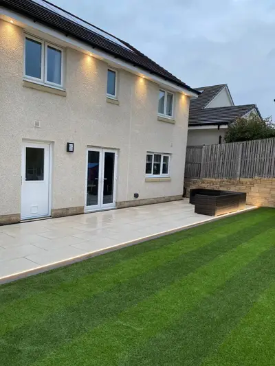 Porcelain patio with LED lighting and new lawn