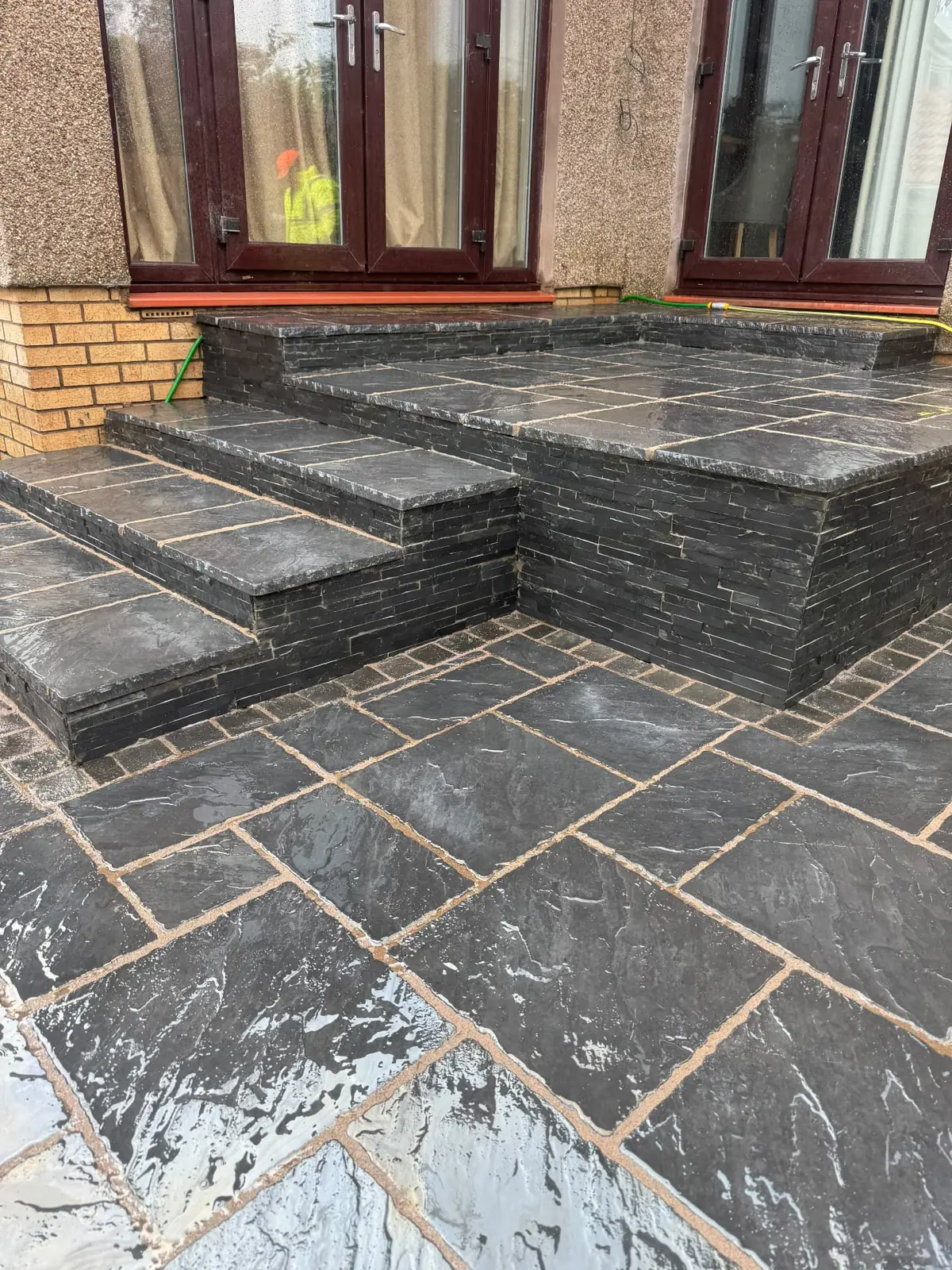 Slate patio with built-in steps