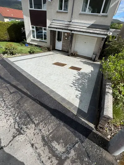 Block-paved driveway with dark border edging